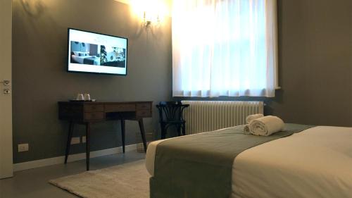 Letto o letti in una camera di Villa Gotti Charming Rooms