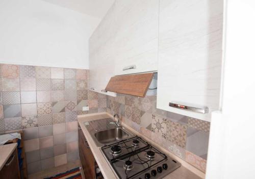 Kuchyňa alebo kuchynka v ubytovaní B&B Profumi di Sicilia