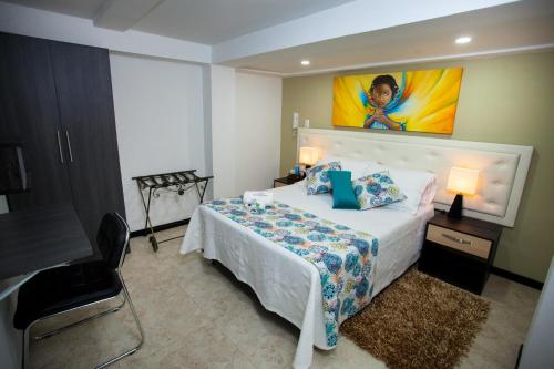 Postel nebo postele na pokoji v ubytování Hotel San Blass Boutique