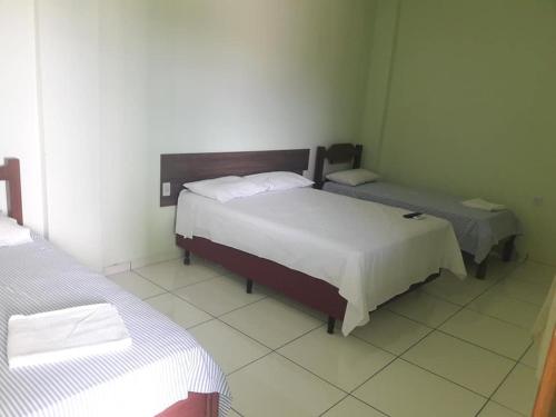 Postel nebo postele na pokoji v ubytování Pousada Pantaneira