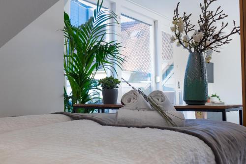 Ένα ή περισσότερα κρεβάτια σε δωμάτιο στο Apartments an der Universität