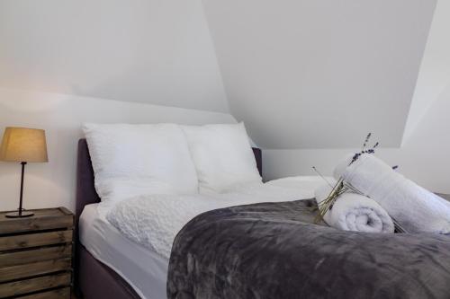 Ένα ή περισσότερα κρεβάτια σε δωμάτιο στο Apartments an der Universität