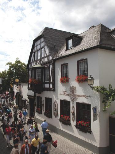 a group of people standing outside of a building at Hotel Felsenkeller in Rüdesheim am Rhein