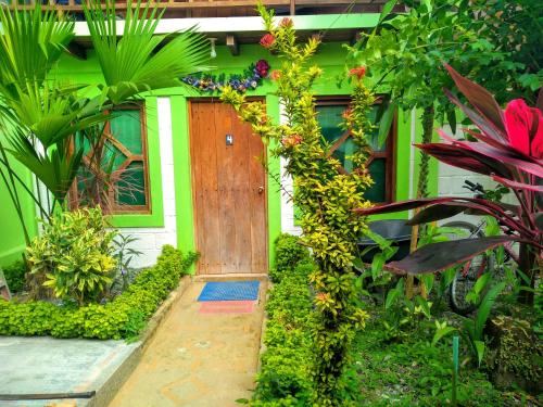 Un jardín fuera de Hostal Capurgana