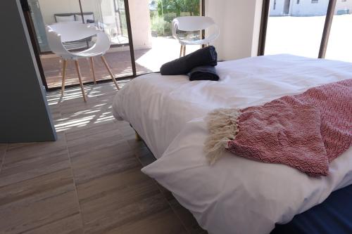 Postel nebo postele na pokoji v ubytování Modern secure beach house in Mykonos