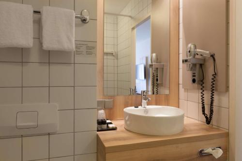 Koupelna v ubytování Best Western Hotel Baars