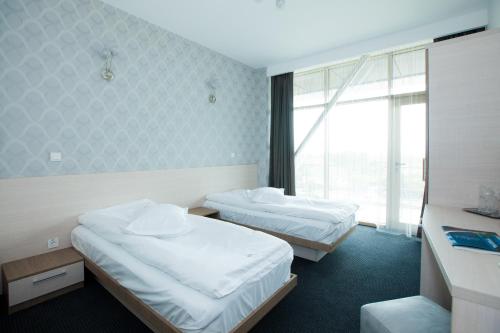 Katil atau katil-katil dalam bilik di Albert Hotel
