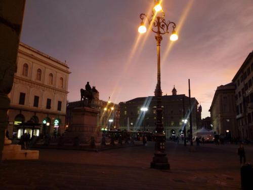 a street light in a city at night at B&B Amarantha Gothica Genoa in Genova