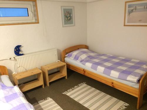 A bed or beds in a room at Ferienwohnung Lortz