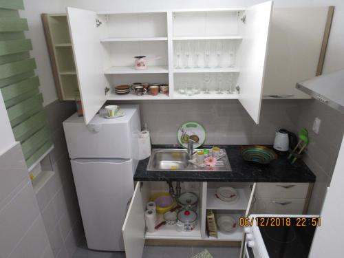 Η κουζίνα ή μικρή κουζίνα στο Apartman Tea 2