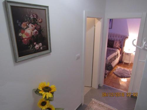 Ένα ή περισσότερα κρεβάτια σε δωμάτιο στο Apartman Tea 2