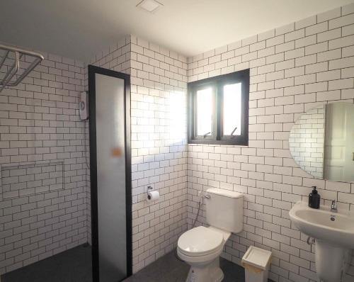 Kylpyhuone majoituspaikassa WIW mini hotel