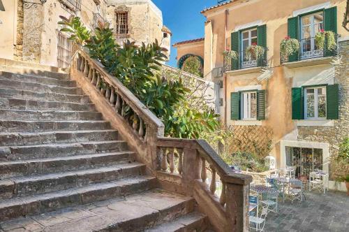 a set of stairs leading up to a building at Palazzo Gentilcore in Castellabate