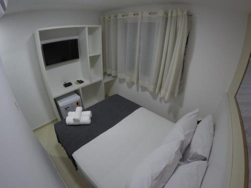 Cama o camas de una habitación en Pousada Kanoas