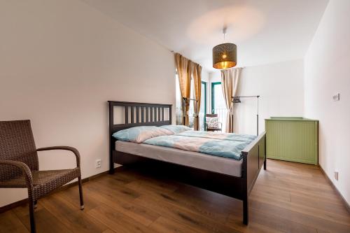 Postel nebo postele na pokoji v ubytování Bellevue Keilberg Exclusive