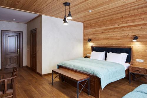 Ένα ή περισσότερα κρεβάτια σε δωμάτιο στο Ganz & SPA