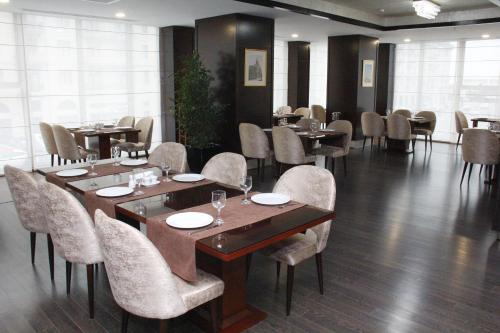 
A restaurant or other place to eat at Harmony Hotel Baku
