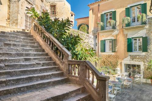 a set of stairs leading up to a building at Palazzo Gentilcore in Castellabate