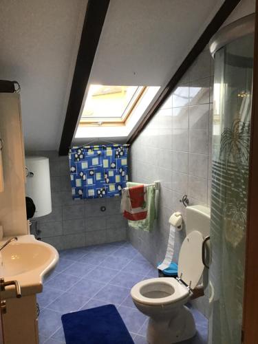 Kúpeľňa v ubytovaní Apartman Carina