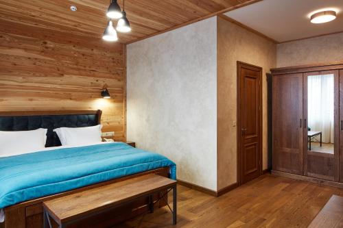 Ένα ή περισσότερα κρεβάτια σε δωμάτιο στο Ganz & SPA