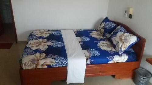 Een bed of bedden in een kamer bij Chez Sabine