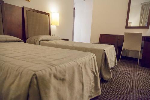 Hotel dei Gonzagaにあるベッド