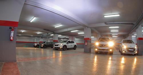 a parking garage with several cars parked in it at RESIDENCE TOURISTIQUE DU PORT in Alger