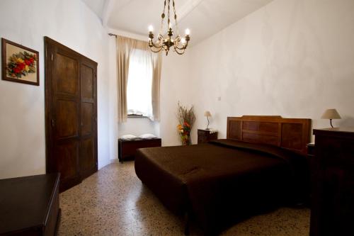 Postel nebo postele na pokoji v ubytování Da Rosa al Borgo