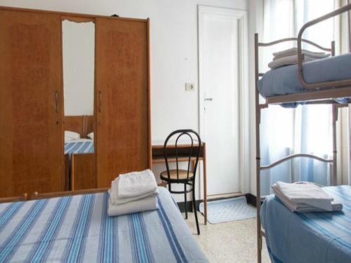 En eller flere senger på et rom på Hotel Ronconi