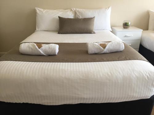 Ένα ή περισσότερα κρεβάτια σε δωμάτιο στο Port Pirie Accommodation and Apartments