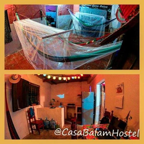una sala de estar con una red en una casa en Casa Balam Hostel Sisal, en Sisal