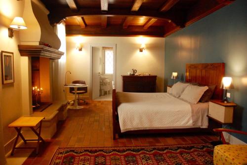 a bedroom with a large bed in a room at Corielli B&B in Malo