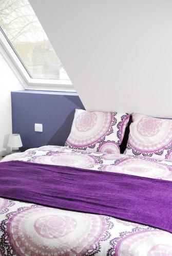 Postel nebo postele na pokoji v ubytování B&B Het Schaliënhof