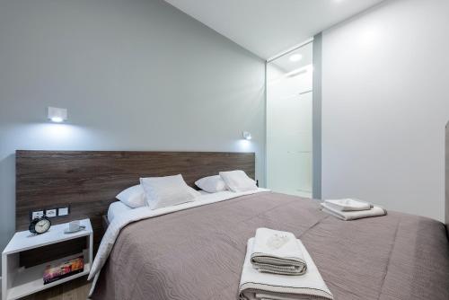 Posteľ alebo postele v izbe v ubytovaní Apartament Luxury Miedzyborska 8b