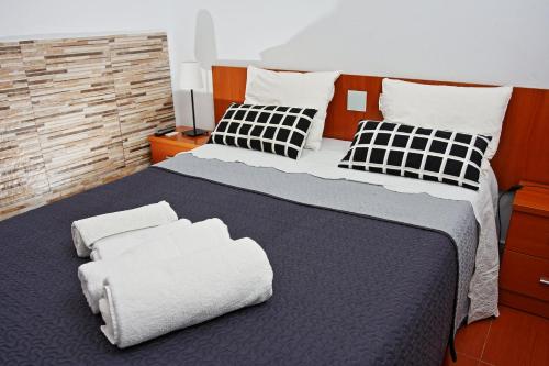 Ένα ή περισσότερα κρεβάτια σε δωμάτιο στο apartamento canarias