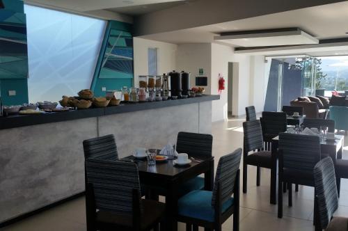 Reštaurácia alebo iné gastronomické zariadenie v ubytovaní Domus Lake Resorts