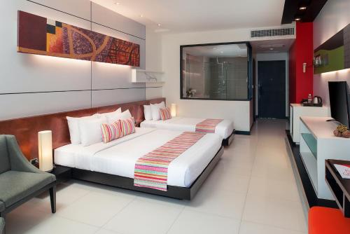 The Zign Hotelにあるベッド