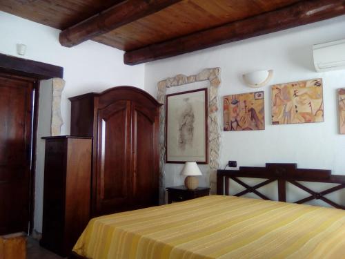 Villa Adriana - Torre delle Stelle - mini appartamenti - Cagliari Villasimus Sardegna 객실 침대
