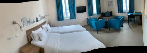 Hotel Donauにあるベッド