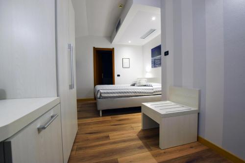 Tempat tidur dalam kamar di Albergo Ristorante Orazio