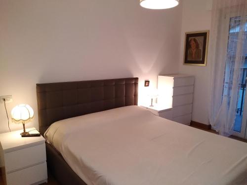 Кровать или кровати в номере Appartamento Monti e Relax