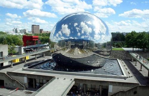 a large silver ball sitting on top of a building at Residence Hoche in Le Pré-Saint-Gervais
