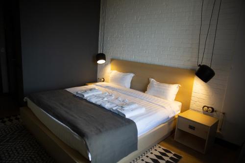 Katil atau katil-katil dalam bilik di Eleven Hotel and Hall