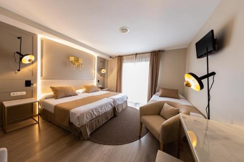 Кровать или кровати в номере Hotel Casablanca