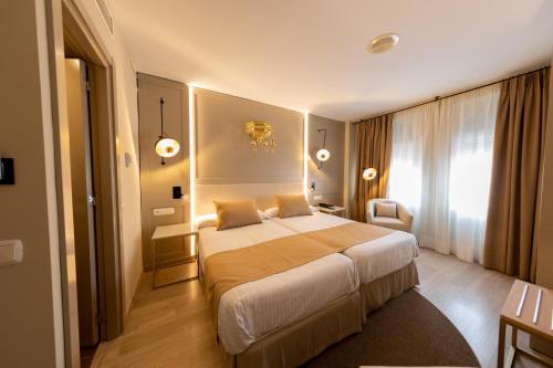 Кровать или кровати в номере Hotel Casablanca
