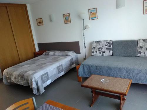 Vuode tai vuoteita majoituspaikassa Apartamentos Leziria