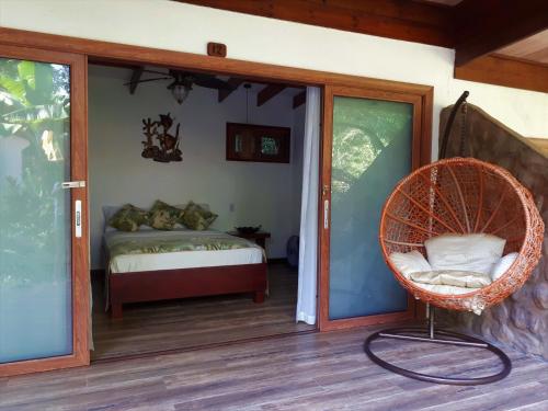 Postel nebo postele na pokoji v ubytování Playa Bluff Lodge