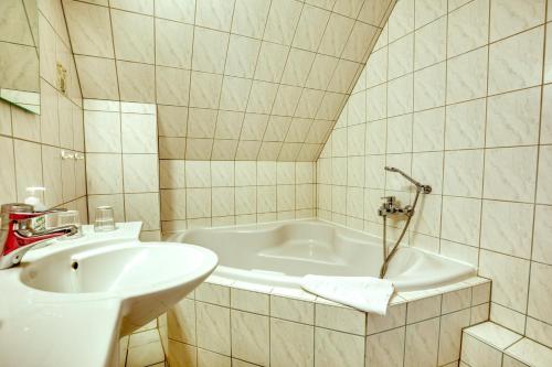 Ein Badezimmer in der Unterkunft Hotel Kiebitz an der Ostsee
