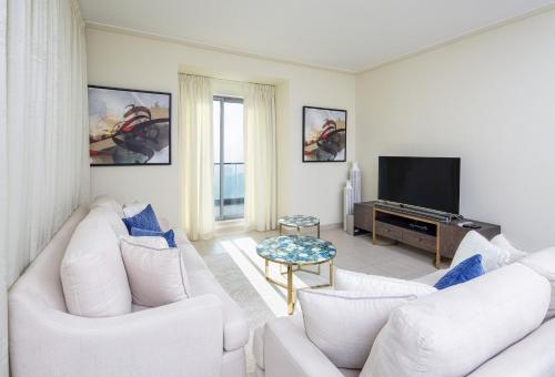 Μια τηλεόραση ή/και κέντρο ψυχαγωγίας στο Nasma Luxury Stays - Fantastic Burj Khalifa View From This Fancy Condo