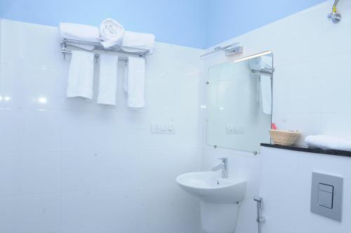 Koupelna v ubytování Sreeparthi Hotel